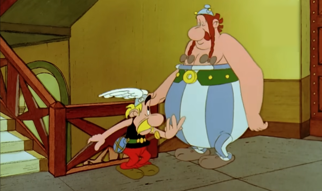 Astérix y Obélix en un edificio romano con un cartel del número IV.
